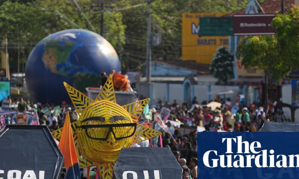 Climate activists carrying fake coffins demand action on fossil fuels in a protest at Cop30 in Brazil in November. Photograph: André Penner/AP