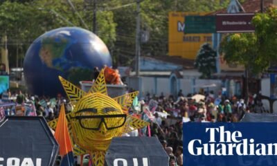 Climate activists carrying fake coffins demand action on fossil fuels in a protest at Cop30 in Brazil in November. Photograph: André Penner/AP