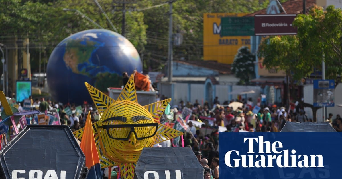 Climate activists carrying fake coffins demand action on fossil fuels in a protest at Cop30 in Brazil in November. Photograph: André Penner/AP