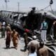 tren militar — Los restos de un vagón de tren, como se ve en la imagen, son consistentes con el ataque con bomba que dejó más de 20 muertos en Pakistán. Foto de: Naseer Ahmed/REUTERS
