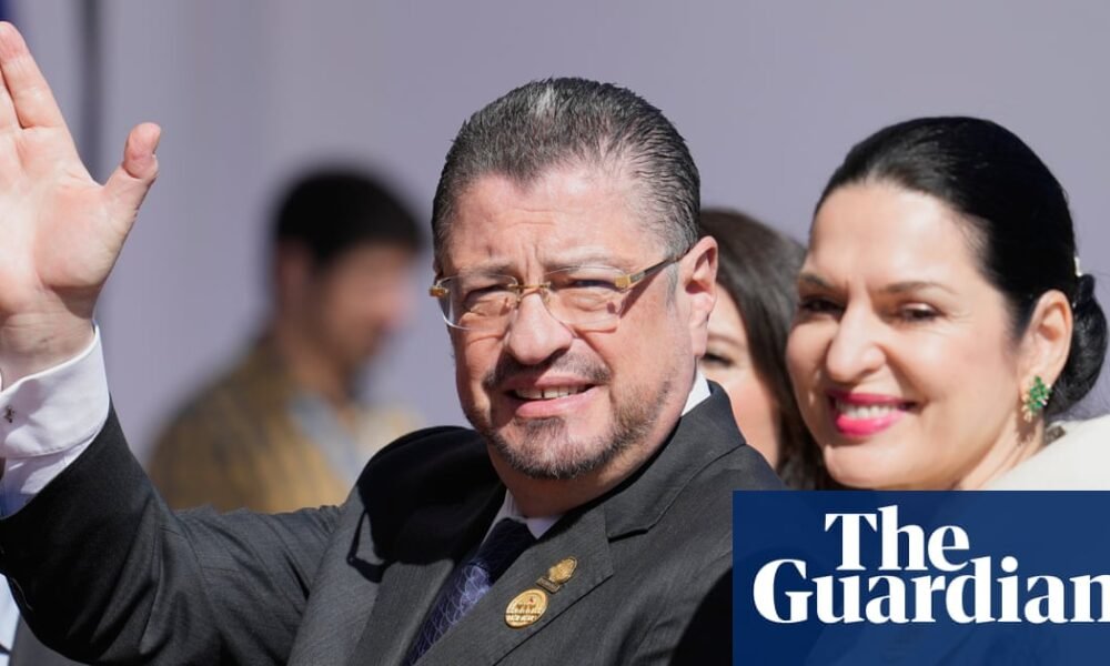 Costa Rica’s president, Rodrigo Chaves, with his wife, Signe Zeicate. Since taking office, Chaves has accused La Nación of being ‘political assassins’. Photograph: Gustavo Garello/AP