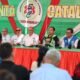 San Juan — Un grupo de hombres sentados tras una mesa larga frente a un fondo que dice Santa Catalina. Foto de: El Peruano