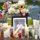 visa u — Un altar con flores y velas en honor a Lorenzo Salgado Araujo en Houston, Texas. Foto de: Karen Warren (AP Photo/Karen Warren